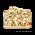 stone carved wall relief sculpture with figure statue